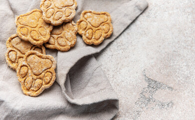 Dog paw print biscuits for homemade treats on napkin