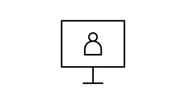 A computer monitor shows a person, who is seated and interacting with the device in a work environment.