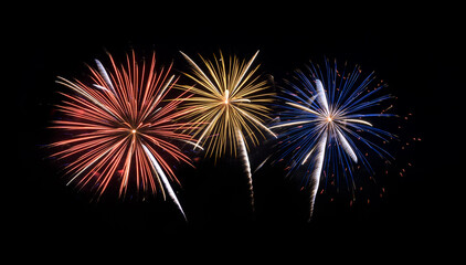 Festive colorful fireworks display isolated on black background for celebration and anniversary