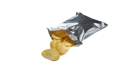 Shiny chocolate chip cookies and a sweet chocolate bar rest on paper next to precious crystal gems and ice like minerals in a macro food decoration isolated on a cold glass surface