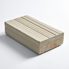 Light beige rectangular block, with vertical striations
