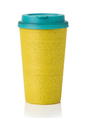 Reusable takeaway coffee cup with yellow textured sleeve and blue plastic lid, eco friendly hot drink container isolated on black background, modern cafe lifestyle