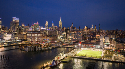 Obraz premium Lower Manhattan skyline. New York aerial view of Manhattan skyscrapers. NYC aerial cityscape. New York City Hudson skyline. New York waterfront. NYC skyscrapers at night, panoramic skyline.
