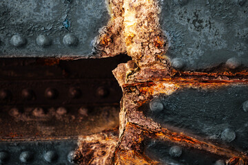 Bridge corrosion for civil engineering. Checker plate rust for heavy industry. Rusty metal grid for...