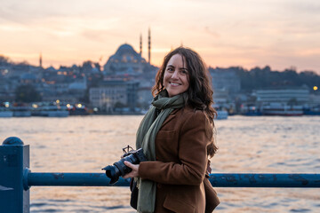 Woman traveling istanbul taking city sunset memories