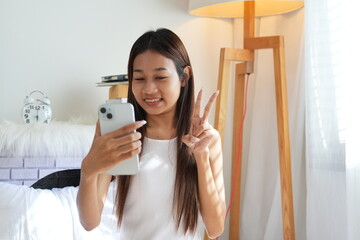 A teenage girl wakes up in the morning and does activities before taking a shower