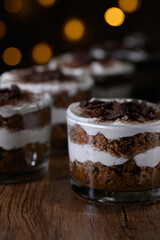 Mini layered sweet desserts for a party, tiramisu with mascarpone and chocolate