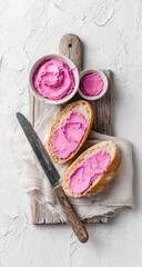 Pink cream cheese spread on bread slices and bowls