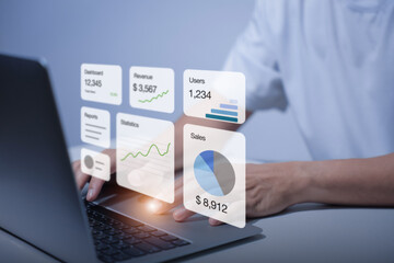 Man is using a laptop to analyze and track sales growth, comparing year-on-year sales. business dashboard interface with analytics widgets including charts, graphs, and statistics.