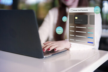 Asian adult woman uses laptop for secure virtual card payments online shopping digital transactions fintech solutions modern banking