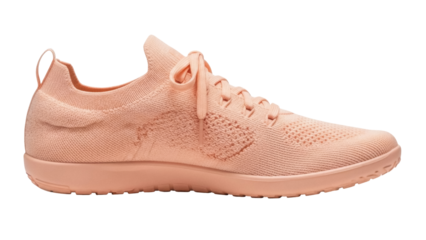 Isolated peach-colored running shoe, casual training sneaker, knitted upper, athletic shoe laces