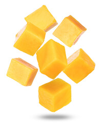 a vibrant photograph showcasing scattered cubes of freshly cut mango against a stark black backdrop, ideal for emphasizing the fruit's vibrant color and texture.