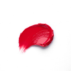 Textured red matte liquid lipstick smear on white background.