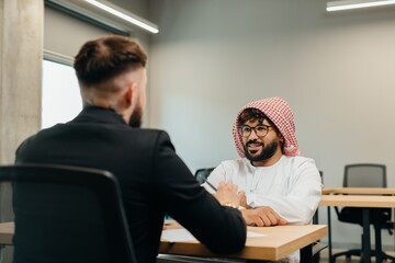 Arabian businessman having job interview in modern office