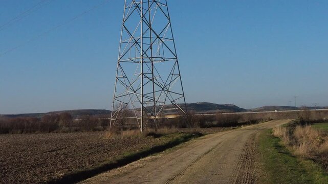 Electrical pylon against a blue sky in Spain