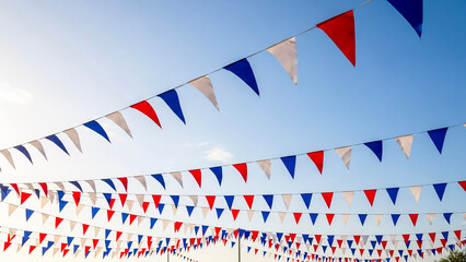 Fototapeta premium Red, white, and blue festive bunting flags on clear sky background 