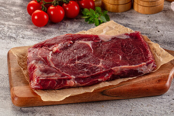 Gourmet raw rib eye steak