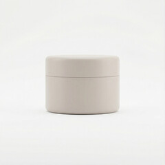 Cream container in minimalist style on white background  