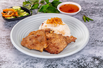 Roasted pork steak with rice