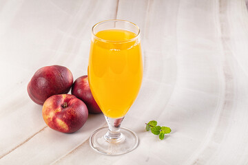 Vitamin beverage - peach juice glass