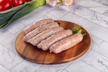 Raw pork sausages for grill