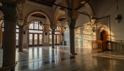 Fototapeta premium Grand Mosque Interior with Arches and Sunlight