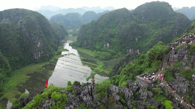 Asia, Ninh B&igrave;nh and Tam Coc in the Red River Delta region of Vietnam - limestone karst formations emerge from rice paddies and rivers "Halong Bay on Earth" - Mua Caves (Hang Mua), 