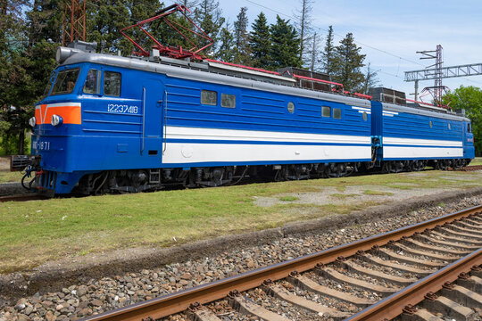 GAGRA, ABKHAZIA - MAY 12, 2025: A Soviet mainline electric locomotive VL10 on the Gagra railway station on a sunny May day