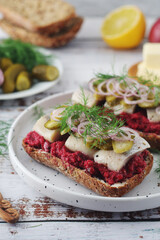 Scandinavian sandwiches with herring and beetroot	
