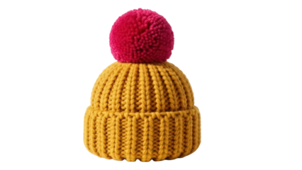 Isolated winter hat with pompom in mustard yellow and pink, knitted woolen accessory, cozy and warm