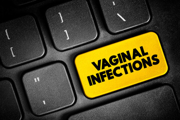 Fototapeta premium Vaginal Infections text button on keyboard, concept background