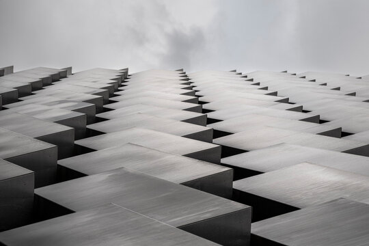 Modern architecture pattern showing geometric abstract building facade with visual repetition minimal detail and contemporary architectural design concept