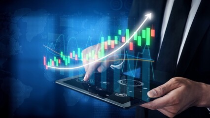 A businessperson interacts with a tablet, showcasing digital graphs and charts. This image symbolizes data analysis, financial growth, and technological advancement. Copula