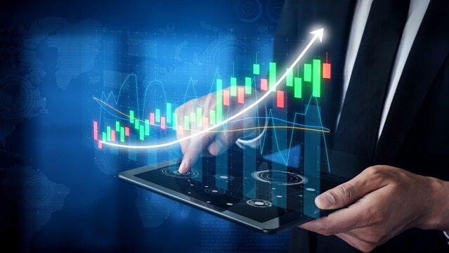 A businessperson interacts with a tablet, showcasing digital graphs and charts. This image symbolizes data analysis, financial growth, and technological advancement. Copula - Powered by Adobe