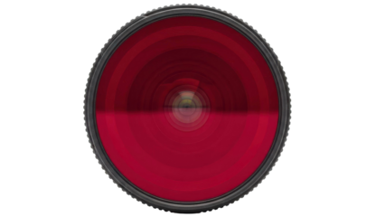 Close up of a red camera lens filter with a dark textured rim and concentric circular patterns viewed against a pure black background creating a dramatic and abstract visual.
