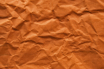 A sheet of crumpled brown paper texture as background