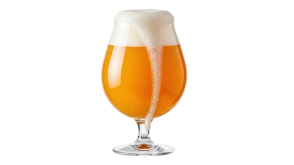 Close up of golden amber beverage with frothy white head overflowing from a clear tulip glass against a solid black background highlighting refreshment and celebratory spirits.