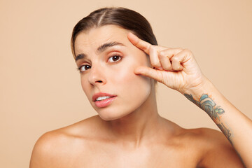 Close up sad beautiful half naked topless young woman 20s with nude make up look camera pov mirror...