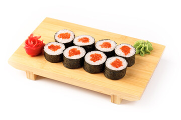 Savoring vibrant sushi rolls brightened by fresh garnishes