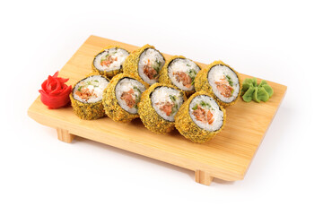 Fresh sushi rolls served with garnishes on a wooden plate