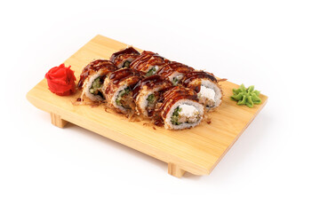 Delicious sushi rolls served on a wooden platter