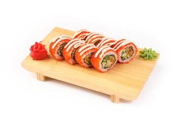 Delicious sushi rolls served on a wooden platter with garnishes