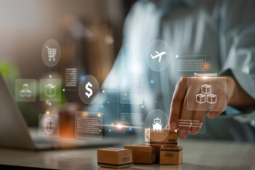 Businessman using laptop with small packages and modern logistics, procurement, shipping and supply chain management.