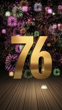Gold number 76 with fireworks in the background. Festive scene for birthday or anniversary party