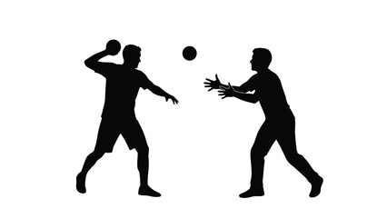 Silhouette of two men playing catch with a ball in dynamic action 