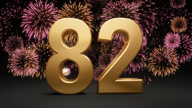 Gold number 82 with fireworks in the background. Festive scene for birthday or anniversary party