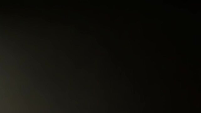 A sign with the word OPEN in large black serif letters inside a thin rectangular border.