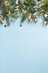 Christmas background with fir branches and serpentine.