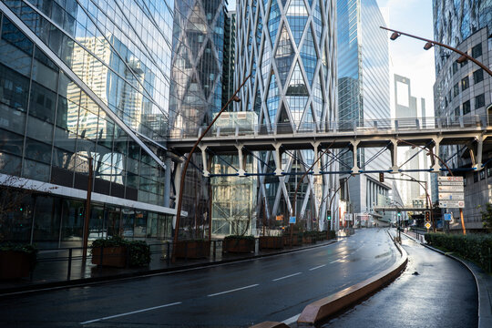 Modern bridge and street in La Defense Paris business district with urban architecture, city infrastructure and corporate environment