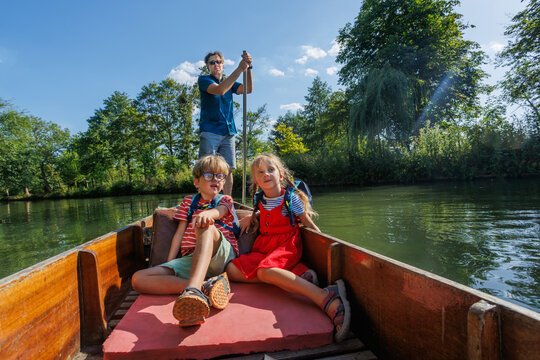 Peaceful river journey with children visiting Oxford, England